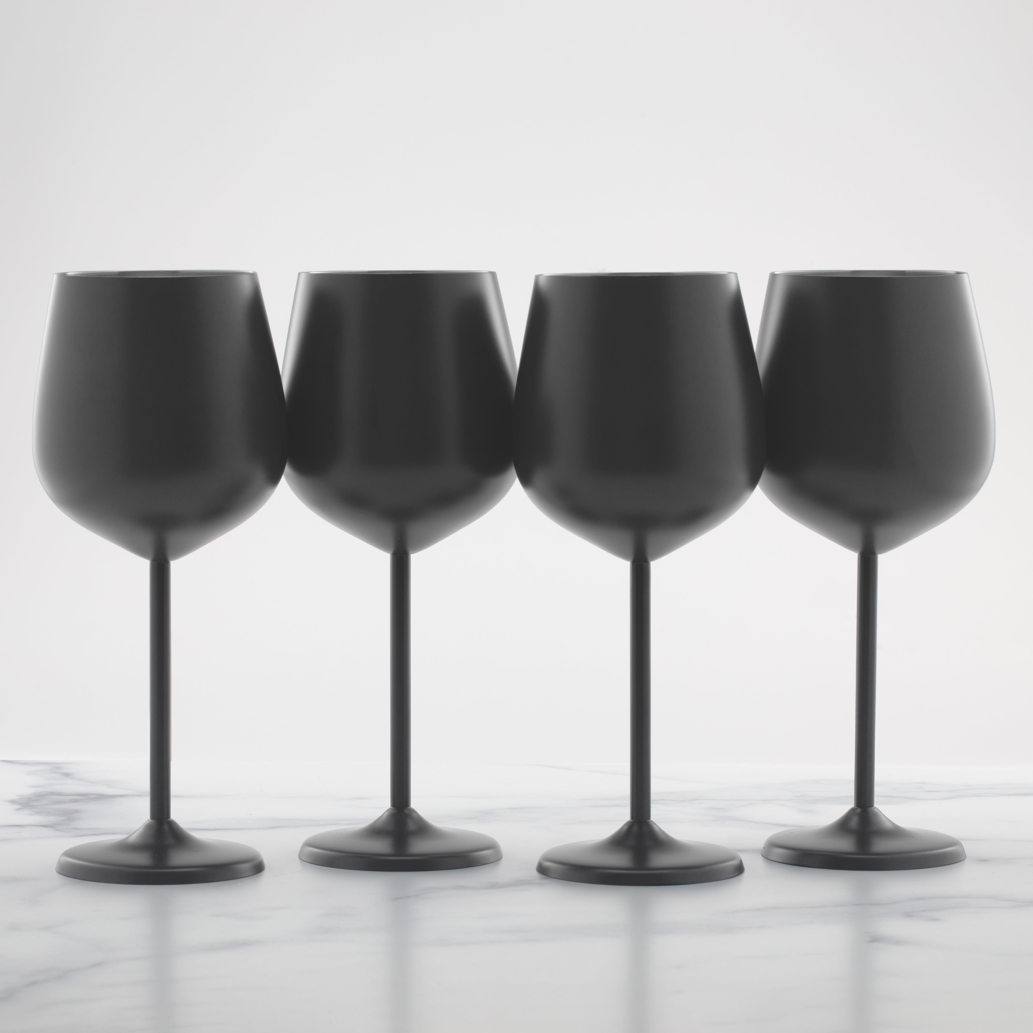 https://cdn.shopify.com/s/files/1/0456/8668/5855/products/EW004CBBLKDSBlackWhiteWineStemless-Group.jpg?v=1646677470