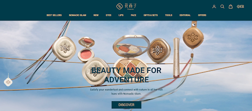 花西子跨境电商网站主页，展示着“蒙古族印象”彩妆产品，包括粉饼、气垫、腮红、眼影盘、唇纱等，背景为清澈湛蓝的天空