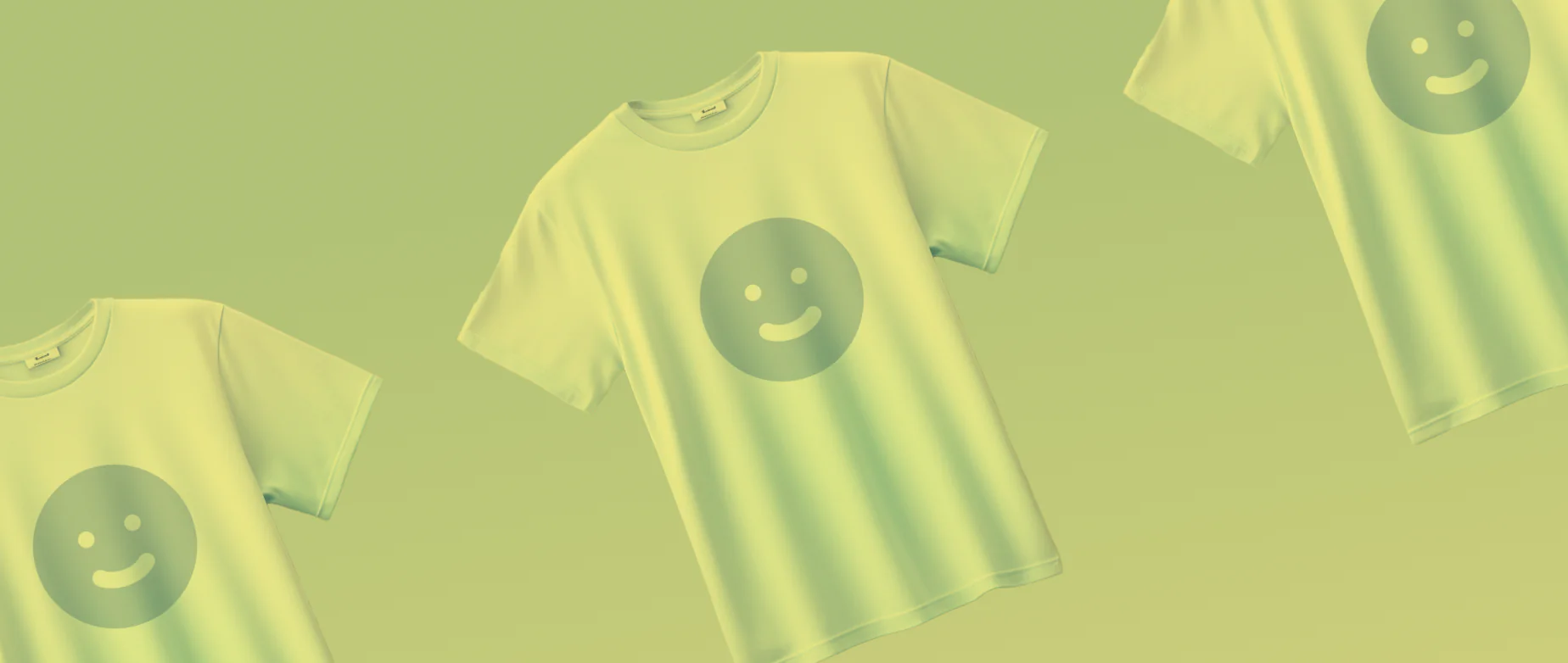 绿色背景上三件印有笑脸图案的T恤