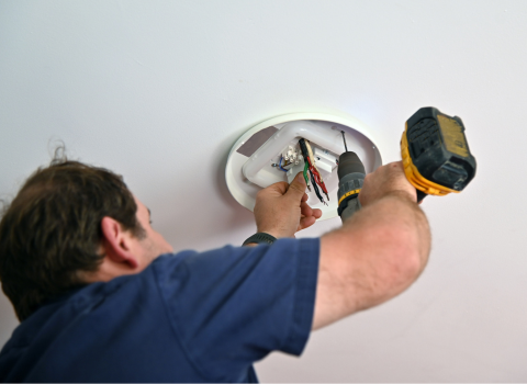 Installing Light Fixtures using a compact drill