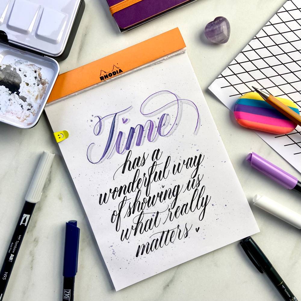 Andra mixes different brush pens in her lettering