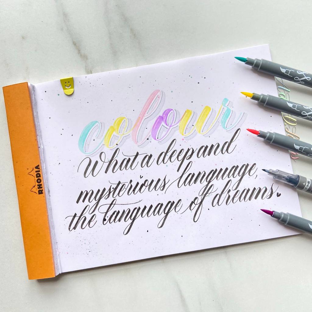 Create this striking quote with pastel lettering and black calligraphy