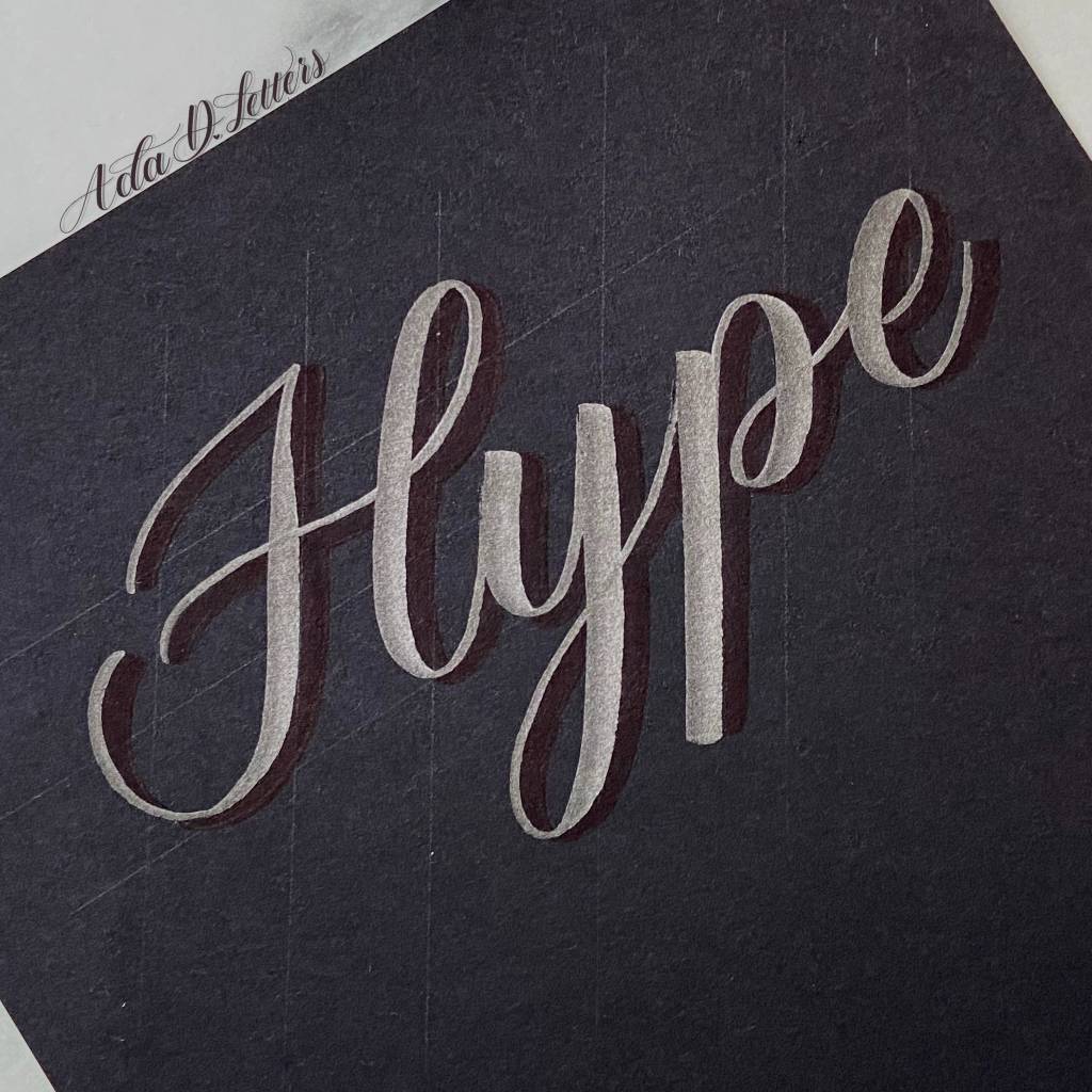 Try adding shadows to your lettering on dark paper