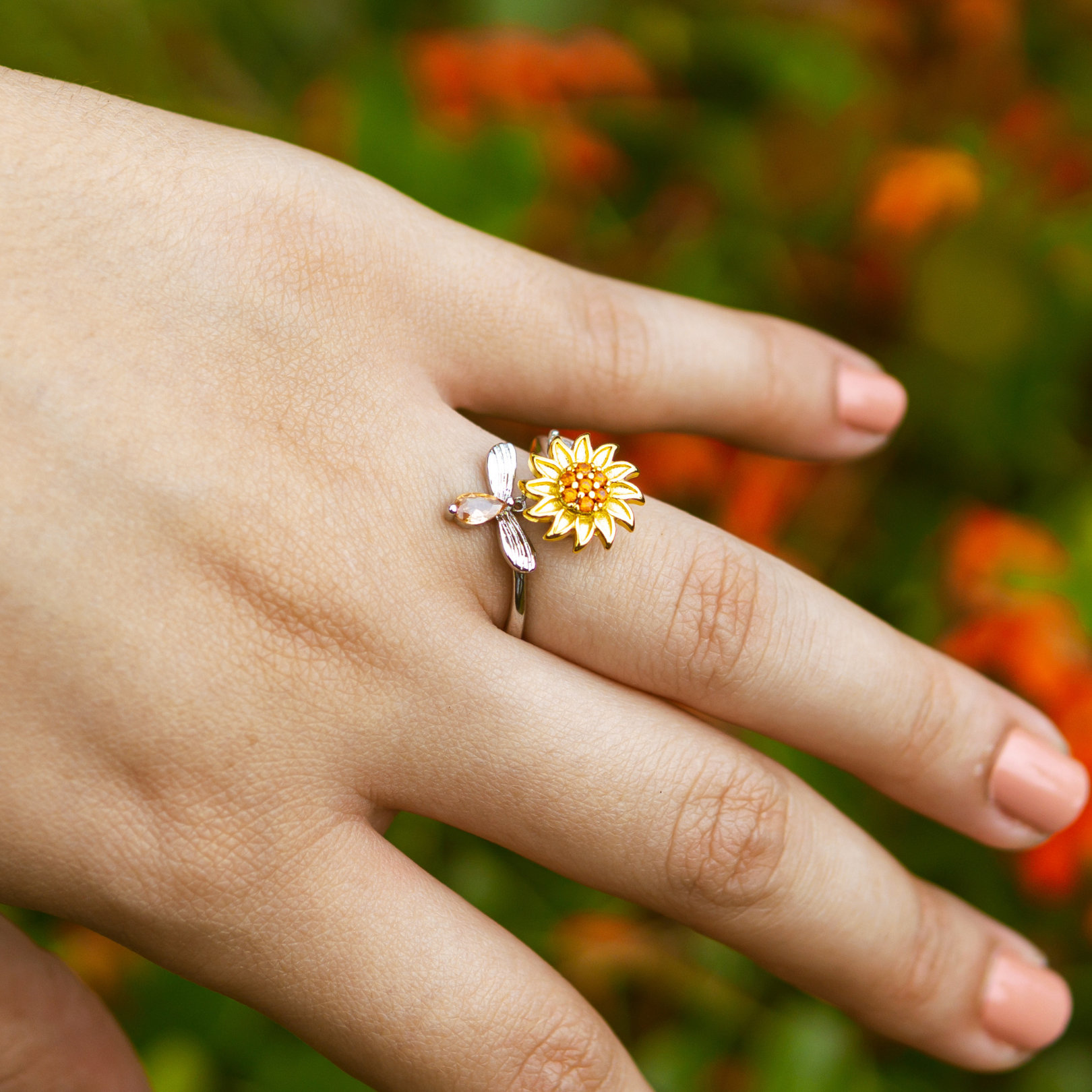 Rotating bee and sunflower ring