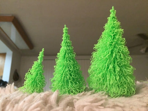 Árbol de navidad hecho con voladizos impreso en pla print3x