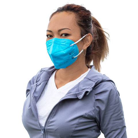 Women wearing blue lutema M95i mask wearing grey workout clothing