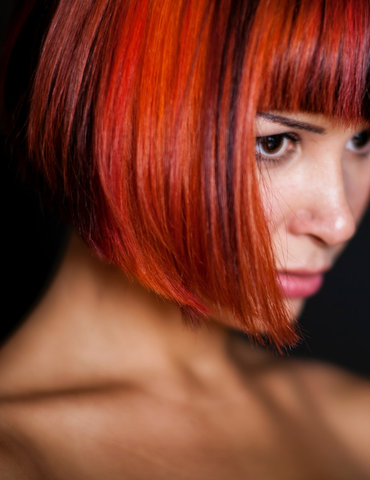 Woman with brightly colored hair