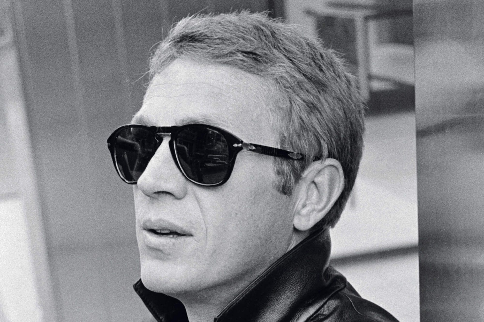 A man wearing black shades