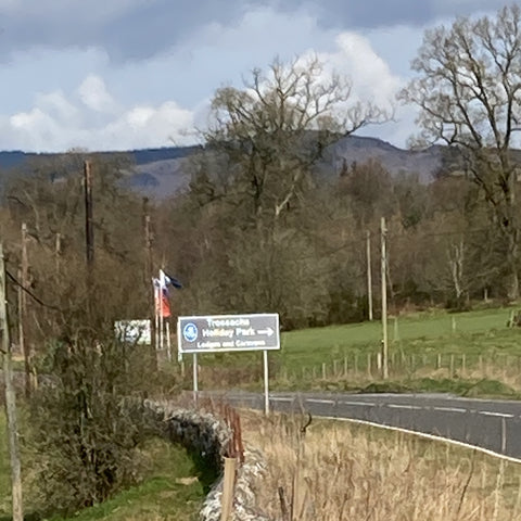 Trossachs Holiday park sign on the road to Aberfoyle