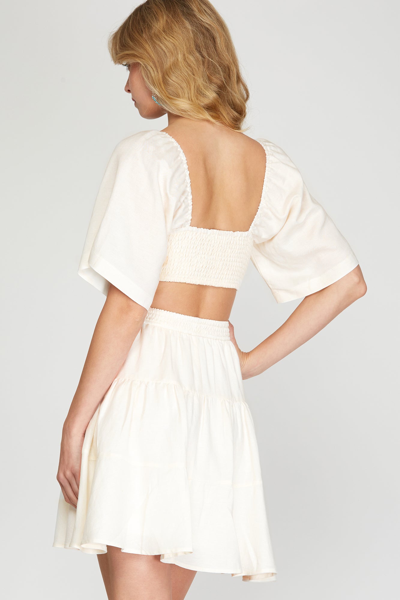 Cream side cut dress