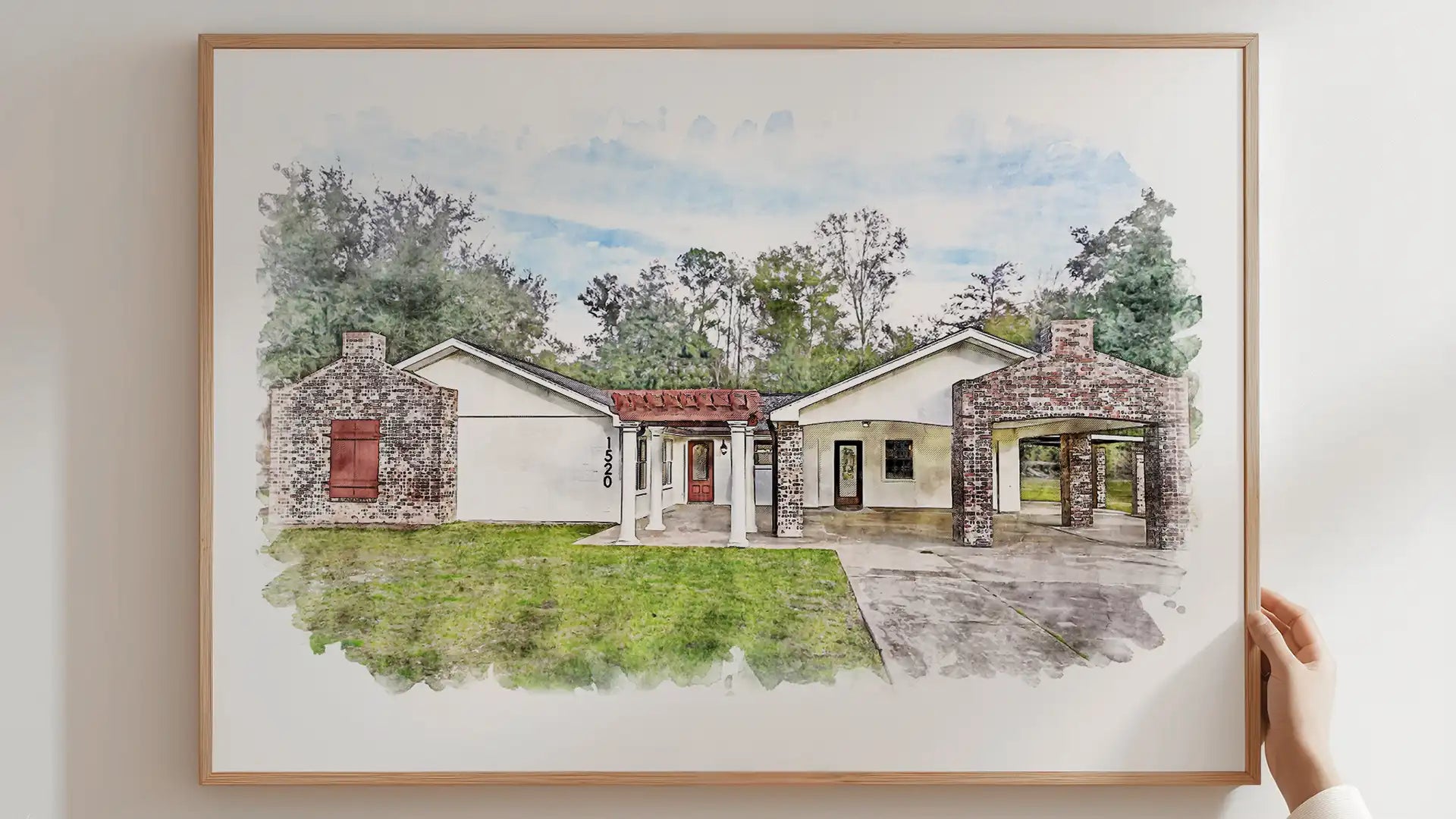 wooden frame watercolor custom house portrait hanging on a wall