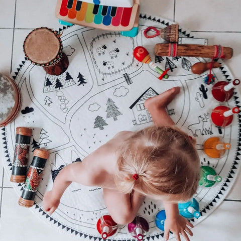 Tapis d'éveil musical pour bébé avec des jouets suspendus et des couleurs vives pour stimuler les sens et l'apprentissage de votre enfant