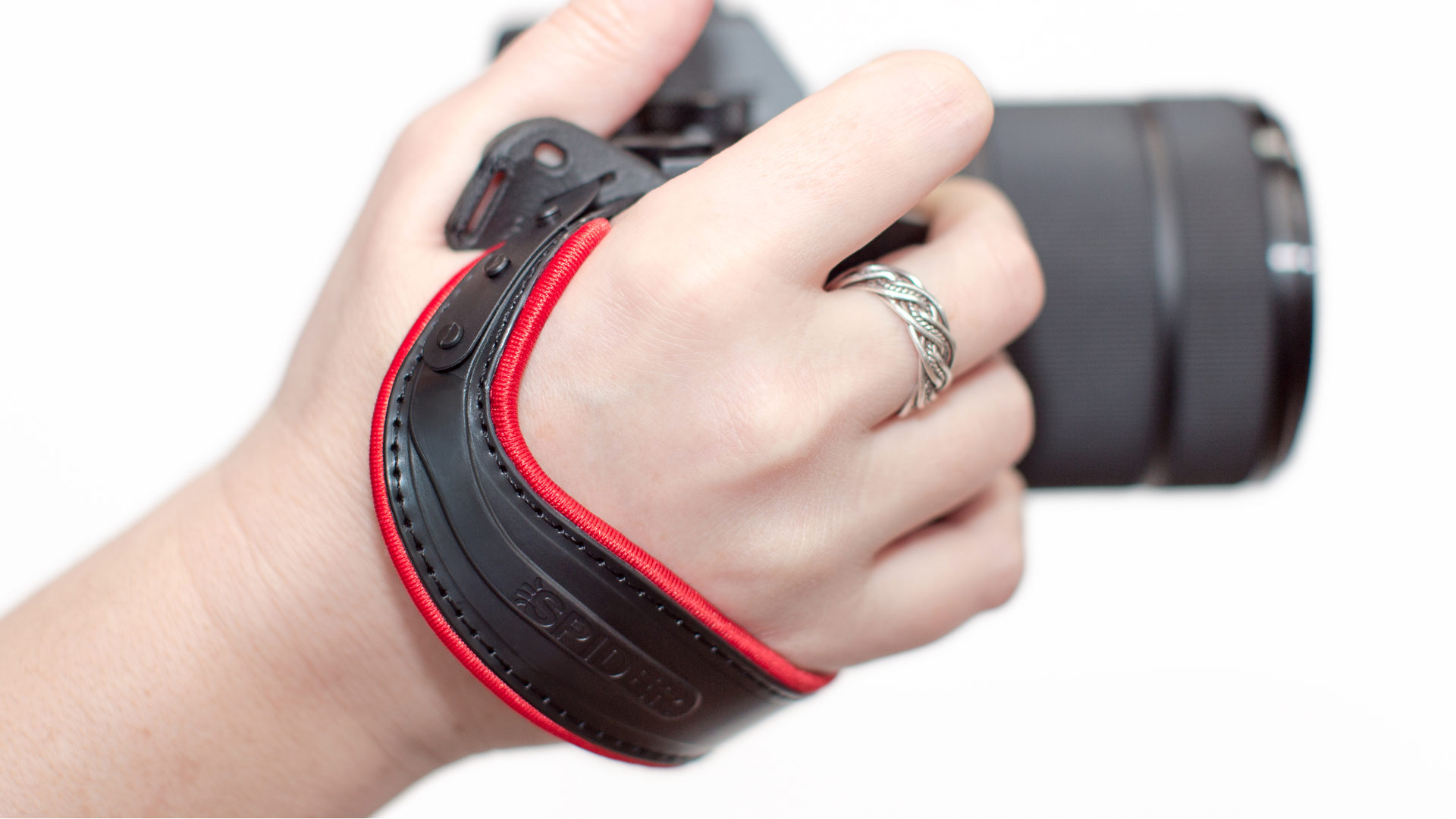 https://cdn.shopify.com/s/files/1/0457/9819/5365/products/SpiderLightHandStrap_Red_sku991.png?v=1660568894