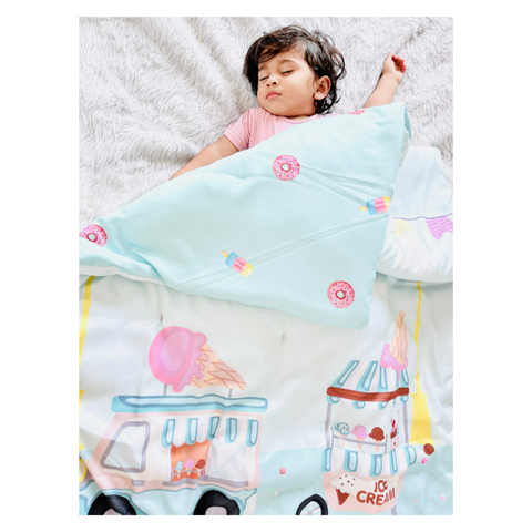 baby using two way reversible blue polyester comforter .