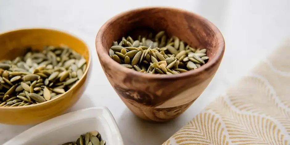 Wooden bowls of pumpkin seeds