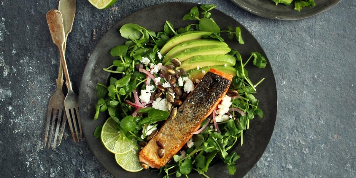 Pan fried salmon with avocado salad and 'quick pickled onion'.