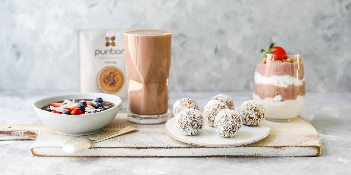 Photograph of Purition served 4 ways; instant oat free porridge, meal shake, energy balls, layered yoghurt bowl.