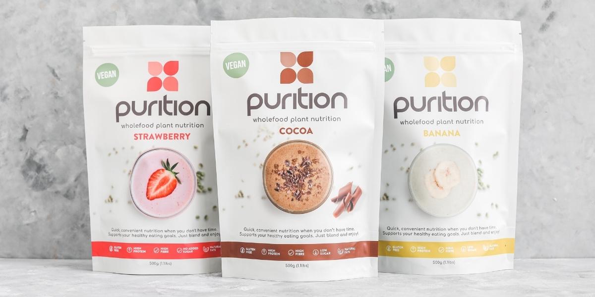 Three large packets of Purition Vegan – Strawberry, Cocoa & Banana 