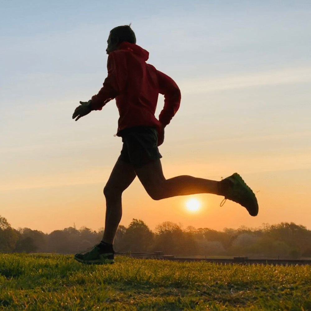 Outdoors; Kristian Morgan training at sunset.