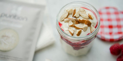 Jar of coconut & raspberry vegan overnight oats