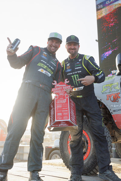 Loren Healy and Vaughn Gittin Jr holding their first place trophy