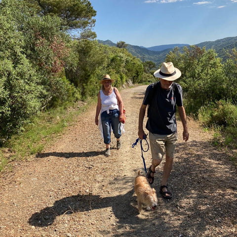 mothers garden olive oil martin and maggie walking in the spring sunshine 