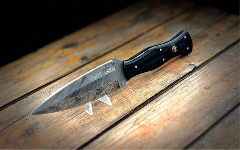 A BigHorn Steel everyday carry knife with a black handle