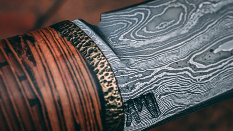 A Damascus steel knife handle