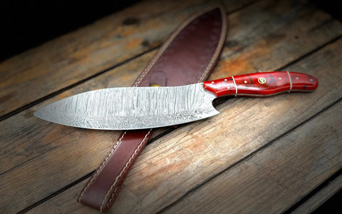 A BigHorn Steel everyday carry knife with a red handle and leather sheath