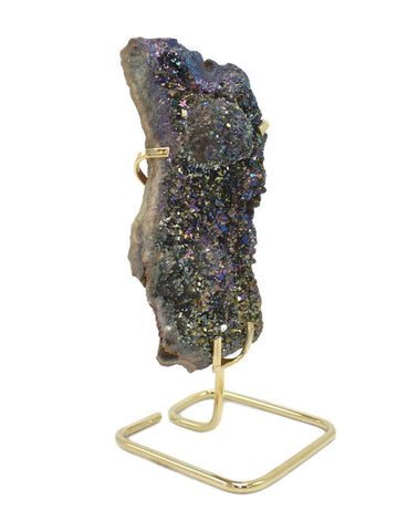 amethyst crystal on a metal stand 