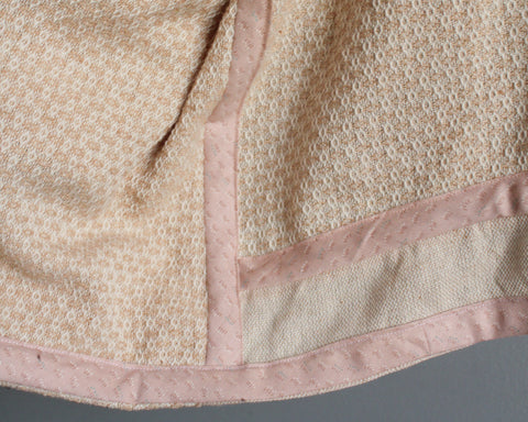 Close up of inside jacket seams showing bias tape