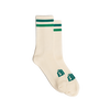 A pair of cream & green colored Shopify Supply Business as Usual Socks with the green Shopify logo on the top of the foot.