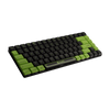 A side aerial view of the Shopify Keyboard lying flat on a transparent background. The keyboard has black and lime green keycaps. The space bar is black with a green trim and has the Shopify logo and green pixels.