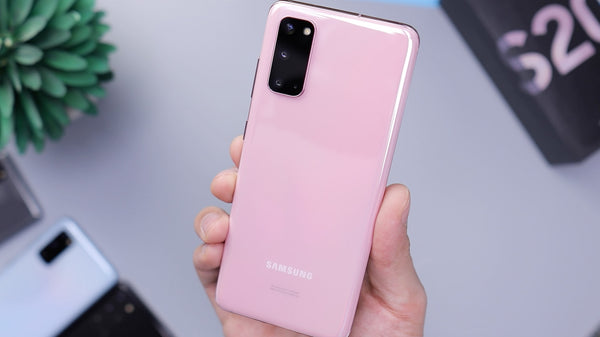 Person holding pink Samsung phone 