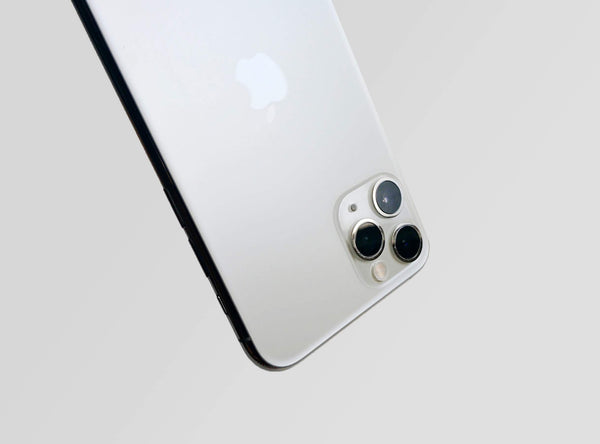 Close up of back of a grey iPhone 13