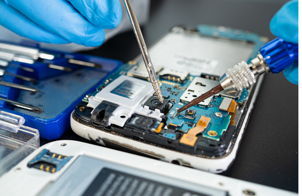 A phone showing the inside while it is being refurbished