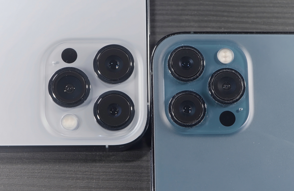 A close up of two phone cameras