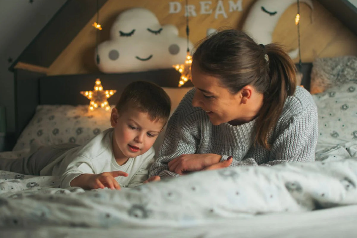 mum and child reading in bed