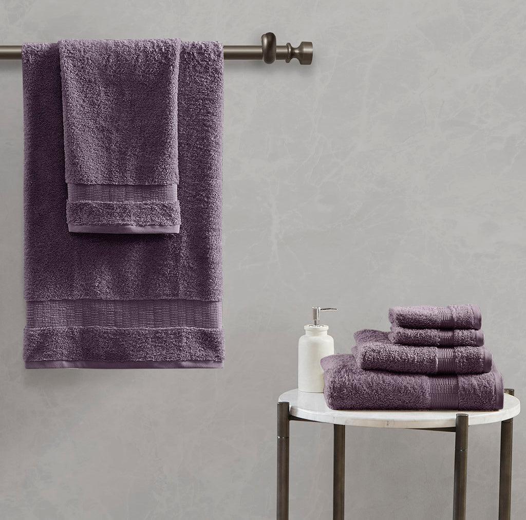 https://cdn.shopify.com/s/files/1/0458/7513/4624/files/luxor-bath-towel-purple-olliix-com-casaone-1.jpg?v=1686664697&width=1024