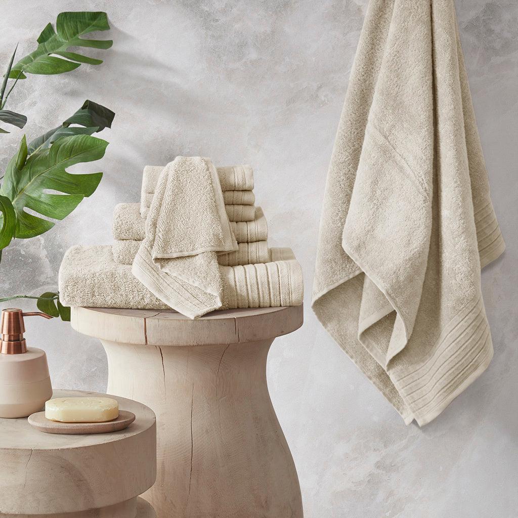 https://cdn.shopify.com/s/files/1/0458/7513/4624/files/mirage-bath-towel-ivory-olliix-com-casaone-1.jpg?v=1686664385&width=1024