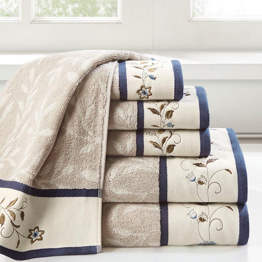 https://cdn.shopify.com/s/files/1/0458/7513/4624/files/serene-embroidered-cotton-jacquard-6-piece-towel-set-navy-olliix-com-casaone-1.jpg?v=1686685533&width=900