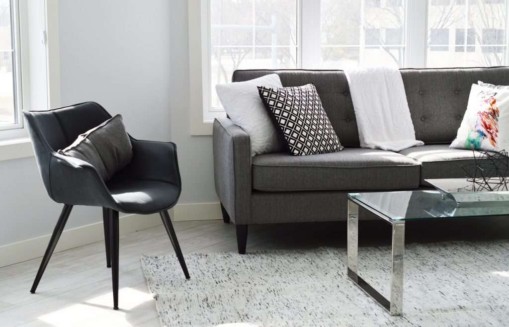 gray chair and sofa in a new living room