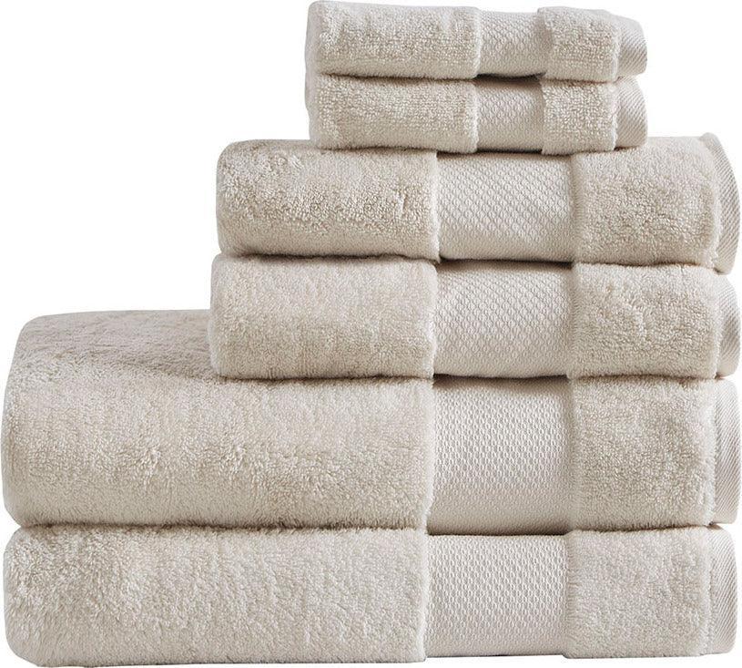 https://cdn.shopify.com/s/files/1/0458/7513/4624/files/turkish-bath-towel-natural-olliix-com-casaone-2.jpg?v=1686664094&width=815