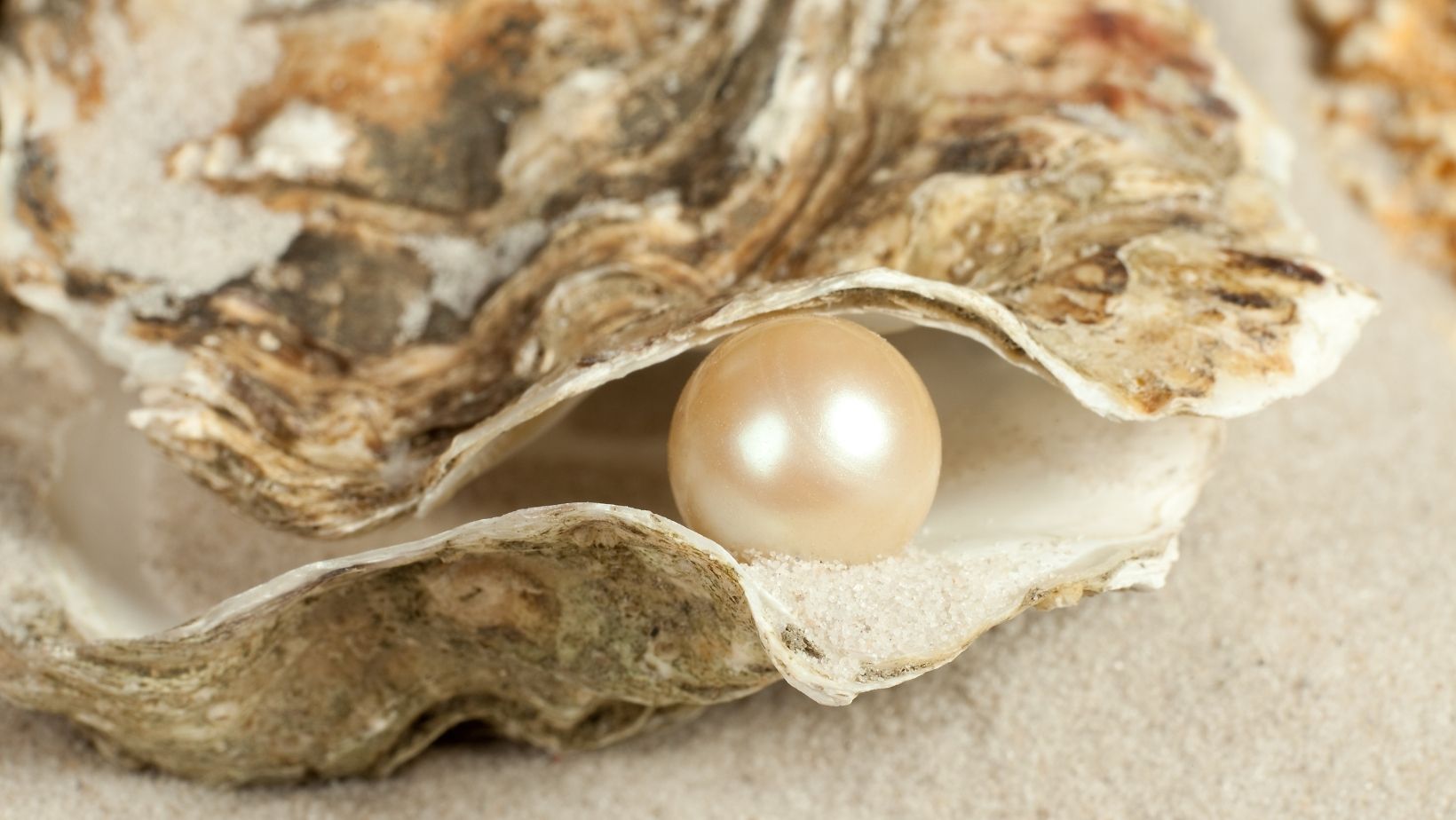 How are pearls formed