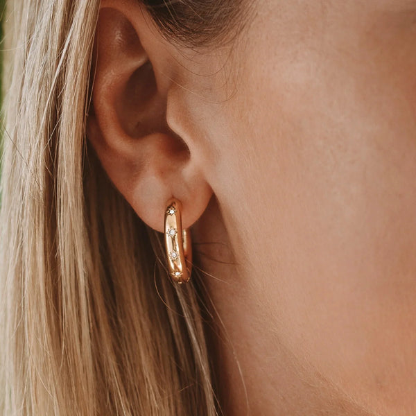 how to style earrings with glasses