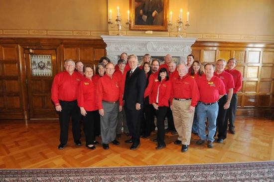 Eureka Springs Citizens in Red Custom Uniforms with Gov. Mike Beebe