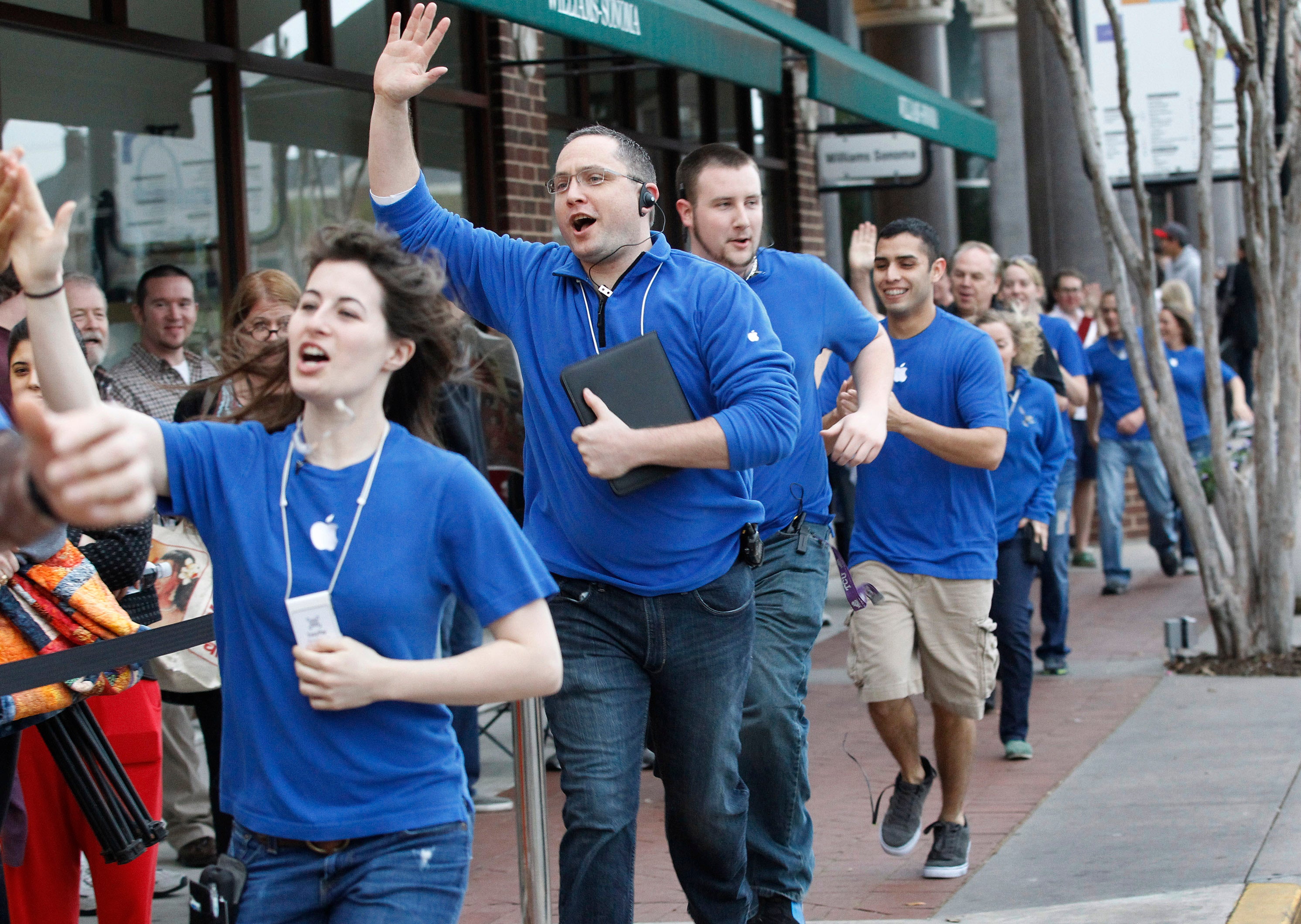 Apple Store Employees with Blue Uniforms