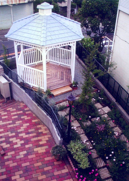 saltbox roof on quaint garage; cupola; strap hinges on