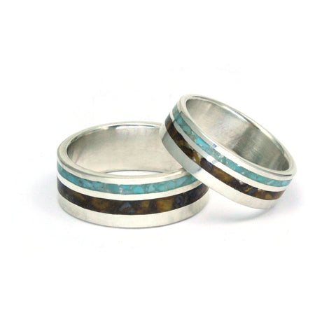 Silver rings with turquoise and brown stripes of stone inlay