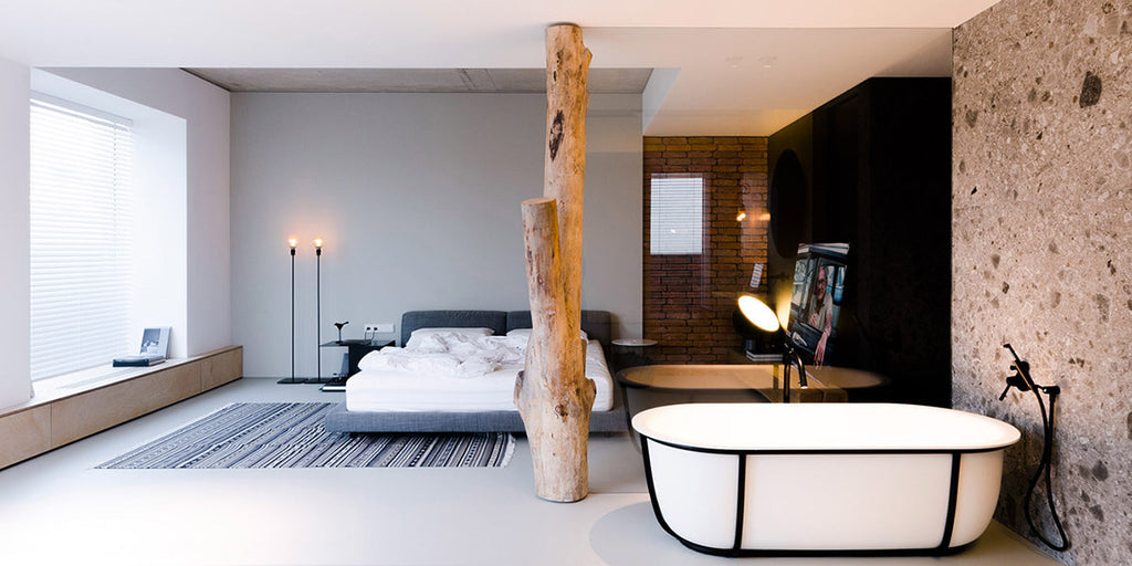 moderne industriële woonstijl slaapkamer met bad